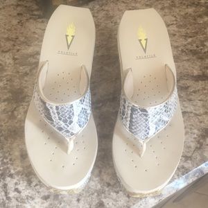 Volatile wedge flip flops